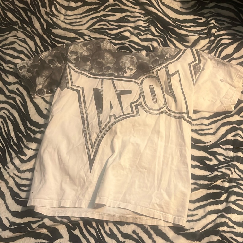 tap out shirt cut at the neck